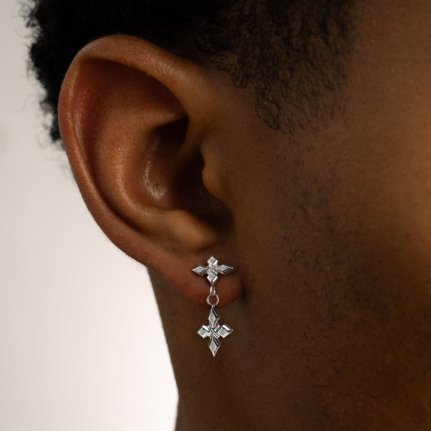 Crossed Star Earrings - Silver